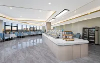 Zhihui orange Hotel (Dongyang Wood Carving City Yintai City Branch) - فطور