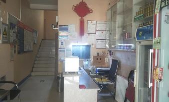 Qira Xinglong Hotel