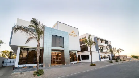 Marigold Hotel Отели рядом с достопримечательностью «Joe's Beerhouse»