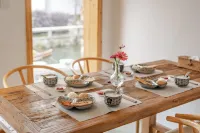 Qianshe Xisu Riverside Inn