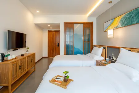 Yishan Jiushe Hostel Отели рядом с достопримечательностью «Shiziwo Temple»