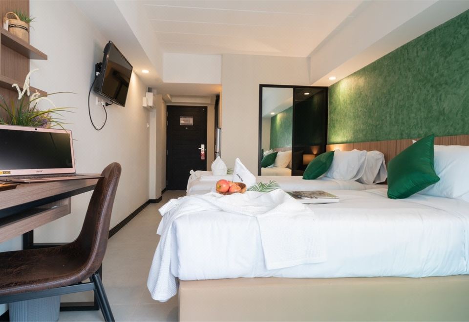 더 홈 호텔 객실 내부 이미지