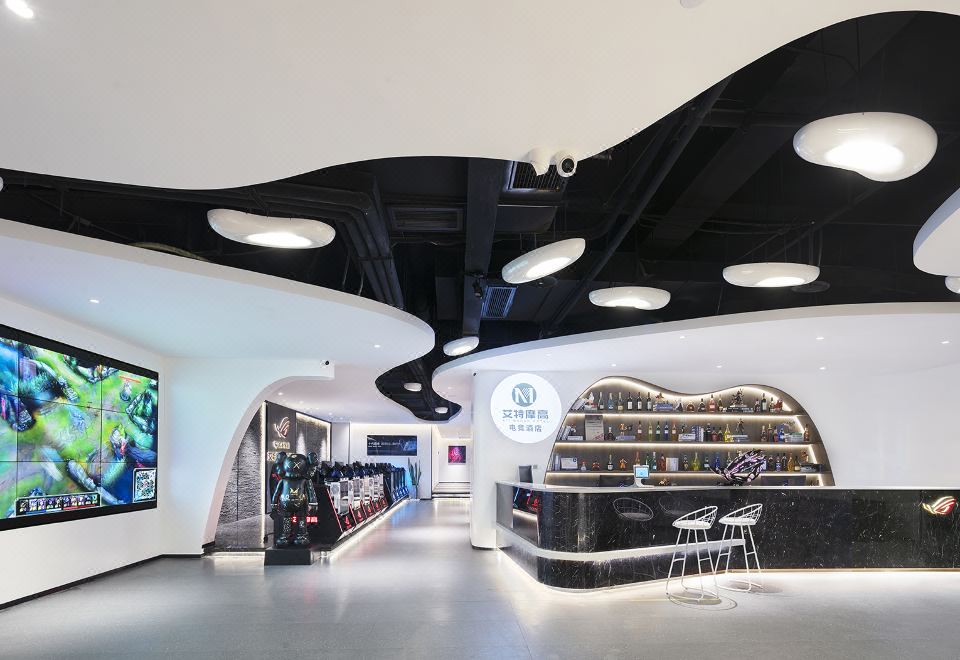 Atmogo E-sports Smart Hotel (Zhengzhou Jincheng Times Square Yaozhai Niezhuang Subway Station)(艾特摩高电竞智能酒店... 