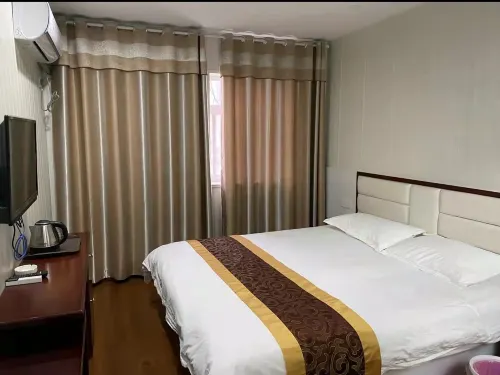 Xinjia Business Hotel