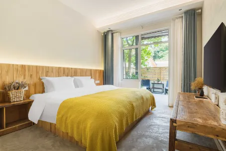 Leshan Fengqiao Yi Garden Inn Отели рядом с достопримечательностью «CPC Leshan Committee Party School»