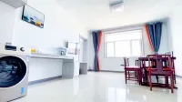 Wuchuan Guoji Homestay - parking