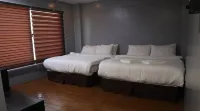 RedDoorz at Kopinos Tourist Inn Hotel Các khách sạn ở Del Carmen