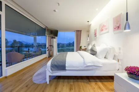 Puzhehei Lotus Emerald Ark Retreat Отели рядом с достопримечательностью «Puzhehei Scenic Area»