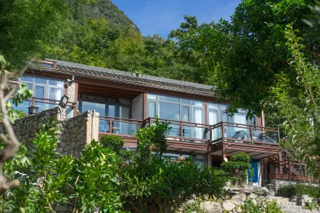 Heyuan Hostel Отели в г. Синъи