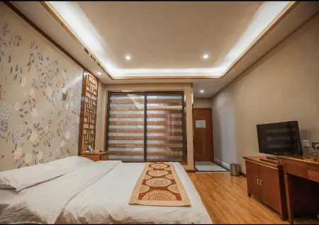 Hupeng Hotel Отели рядом с достопримечательностью «Gymnasium»