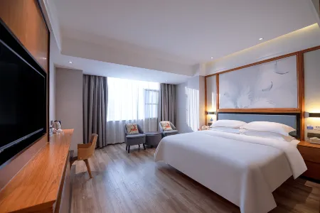 Unitour Hotel (Yulin Rong County Rongzhou Bridge Railway Station) Отели рядом с достопримечательностью «Zhenwu Tower»