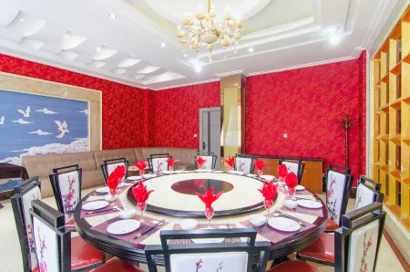 Wogo Hotel (Huangchuan Bus Station)