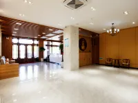 ORANGE HOTEL Hotels in Tailai