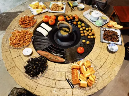 Wuyi Chujian Shan Inn Отели рядом с достопримечательностью «Huangjiali Ancient Trees»