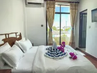 Guraidhoo Palm Inn Hotel a 