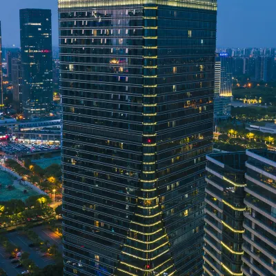 Suzhou Muston Executive Apartment (Jinji Lake Expo Center Branch) Отели рядом с достопримечательностью «Книжный магазин Eslite»