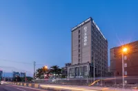 Orange Crystal Hotel Shanghai Zhoupu Wanda (Prosperity Road Metro Station)