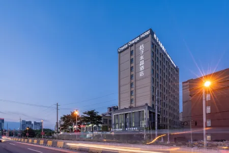 Orange Crystal Hotel Shanghai Zhoupu Wanda (Prosperity Road Metro Station) Отели рядом с достопримечательностью «Shanghai Graduate School of China University of Technology»
