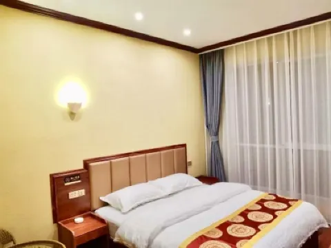 Qujing Tangke Hotel Hotel di Malong District