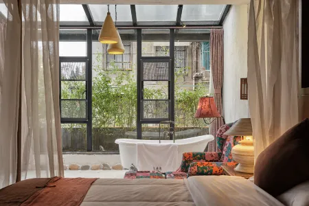 Slanting Lane Hotel Отели в г. Цюйцзин