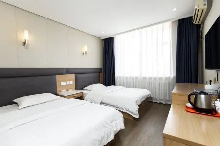 Xiwuqi Jinzun Hotel Отели рядом с достопримечательностью «Baima Cultural Park»