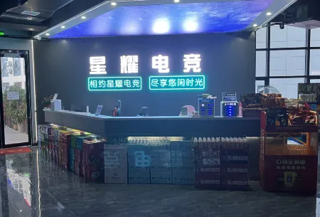 Xingyao Electric Sports Hotel (Southern Minchi Branch) Отели в г. Жунань