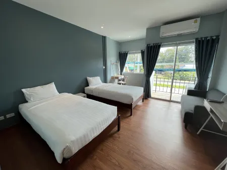 A Hotel Cozy Отели рядом с достопримечательностью «Golden Triangle Park Hall of Opium»