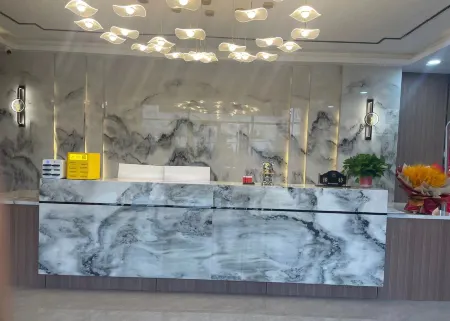 Orange Jin Boutique Hotel Отели рядом с достопримечательностью «Yimeng Mountain Inzone Tianmeng Tourist Area»