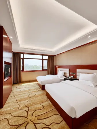 Zhong Yuan Hotel Отели рядом со станцией Luoping Railway Station