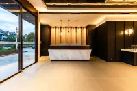 Meiyue Hotel (Mangshi sajiemangshiguangchangBranch) - ที่มีที่จอดรถ