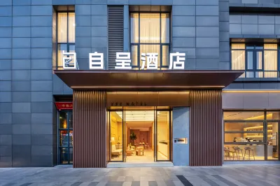 Zee Hotel Hotels in A red building/Pleasure City business district