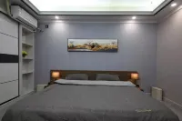 Jinjiang Baolong Plaza B&B