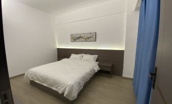 Ru'an Business Apartment (Raoping Qiandongzhen Branch)