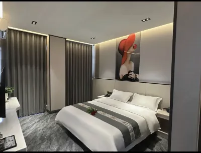 Sencai Hotel (Mengla Star Night Market) Отели рядом с достопримечательностью «Ночный рынок Singling Xinhua Nanlahe»