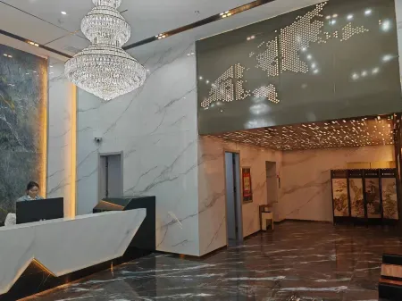 Junhao Business Hotel Отели в г. Фукан