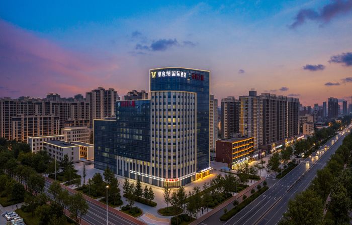 Vienna International Hotel (Heze Shan Development Zone Shunshi Building)