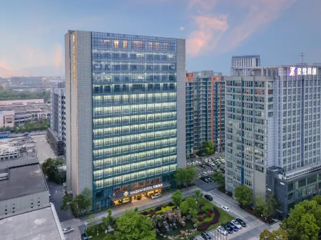 Wassim Hotel (Pukou Metro Line 10 Wan Hui Cheng Qingao Gym) Отели рядом с достопримечательностью «Nanjing University of Technology Pukou Campus»