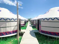 Ou K. Ya Hotel, Dali Lake Отели рядом с достопримечательностью «Гонгерская степь»