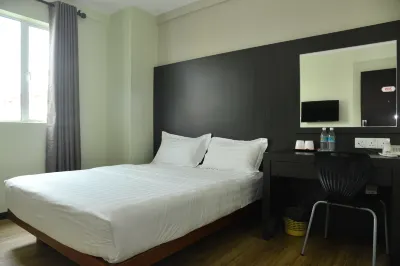 Sunshine Inn Hotel in zona Times Square Megamall