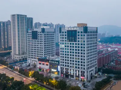 Xingcheng Hotel (Taihu Road branch, Wuyue Plaza, Huzhou) Hotels near Bao＇en Temple