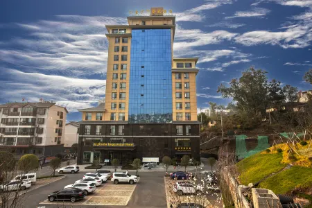 Yongshan Jinsha Impression Hotel Отели рядом с достопримечательностью «Yongshan Passenger Transport Terminal (Post Hotel West)»