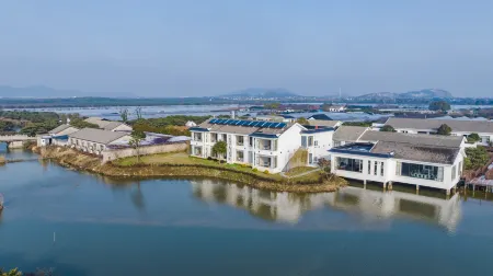 Suzhou Huguangshanshe Hotel (Jinmanting Agricultural Park Branch) Отели рядом с достопримечательностью «Yinshan Island»