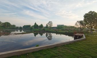 Kunshan Xinyuhuash Homestay (Shangmingdian)