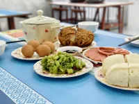 Yunmeng Riverside Homestay (Ergun Wetland Scenic Area) - servizio colazione