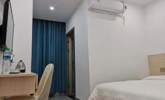 Yudu Zhanqian Business Hotel (Baicheng Railway Station)