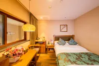Jin Ding Hotel (Yuexia Building) Hotels near Leidong Plateau