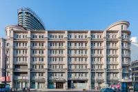 โรงแรมยีเตล คอลเลคชั่น (วิวทะเลสถานีรถไฟชิงเต่า จ้านเฉียว) โรงแรมใกล้Ocean University of China Calligraphy Institute