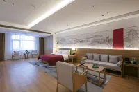 Qianna Meisu Hotel (Shangcai Caimingyuan Branch) فنادق في شانغ تساي