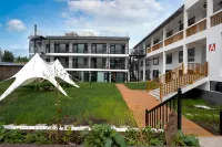 YUNJI HOTEL Отели рядом с достопримечательностью «Nalati Hayin Sai Folk Village»