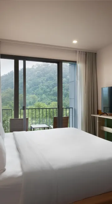 ห้องดีลักซ์ เตียงใหญ่ พร้อมวิวภูเขา